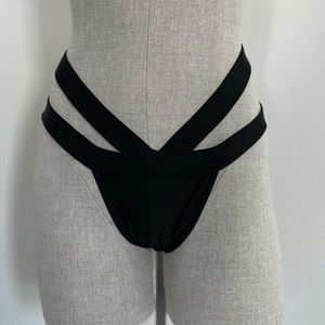 High cut high waisted bikini bottoms with cut outs